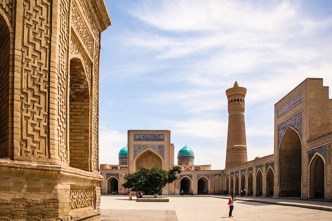 Discover Bukhara One Day Group Experience - Mir-i-Arab Madrasa: turquoise domes and living scholarship